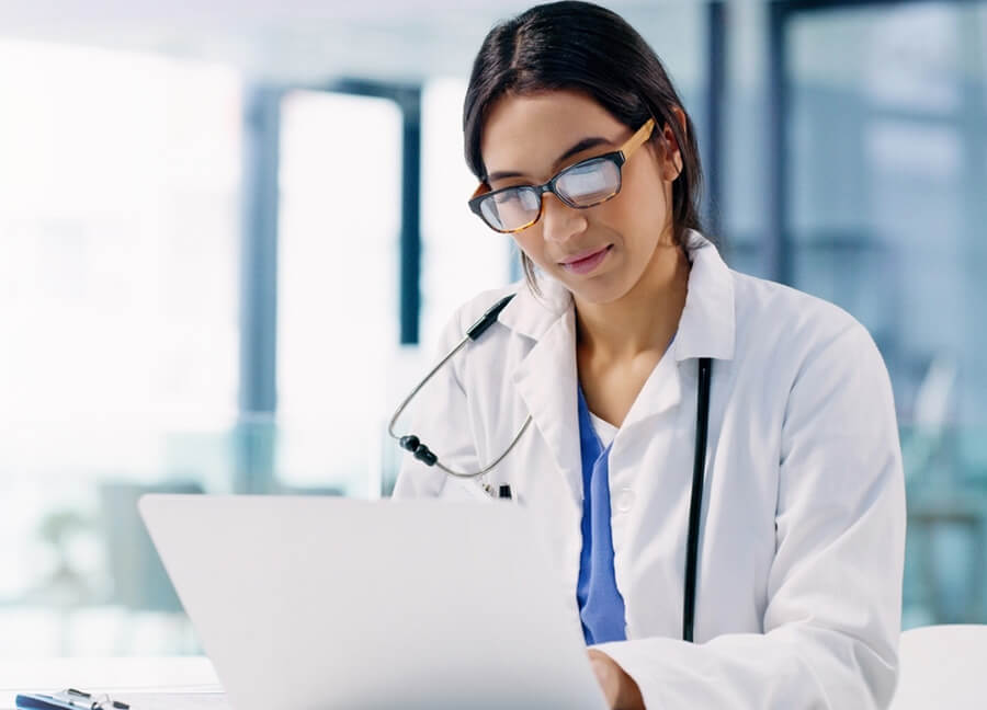 female physician reading documents 