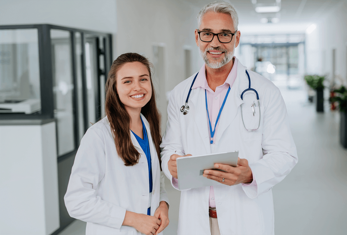 two physicians smiling